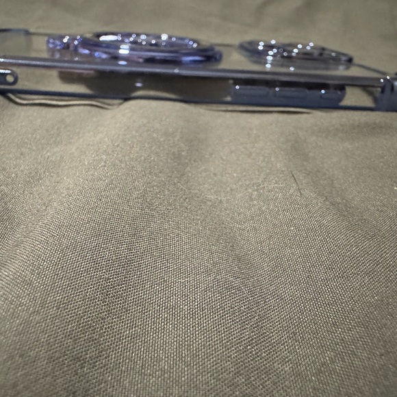 Clear Phone Case with Blue Accents For a 15 Pro Max. Spinning wheel in Center. - Picture 10 of 14